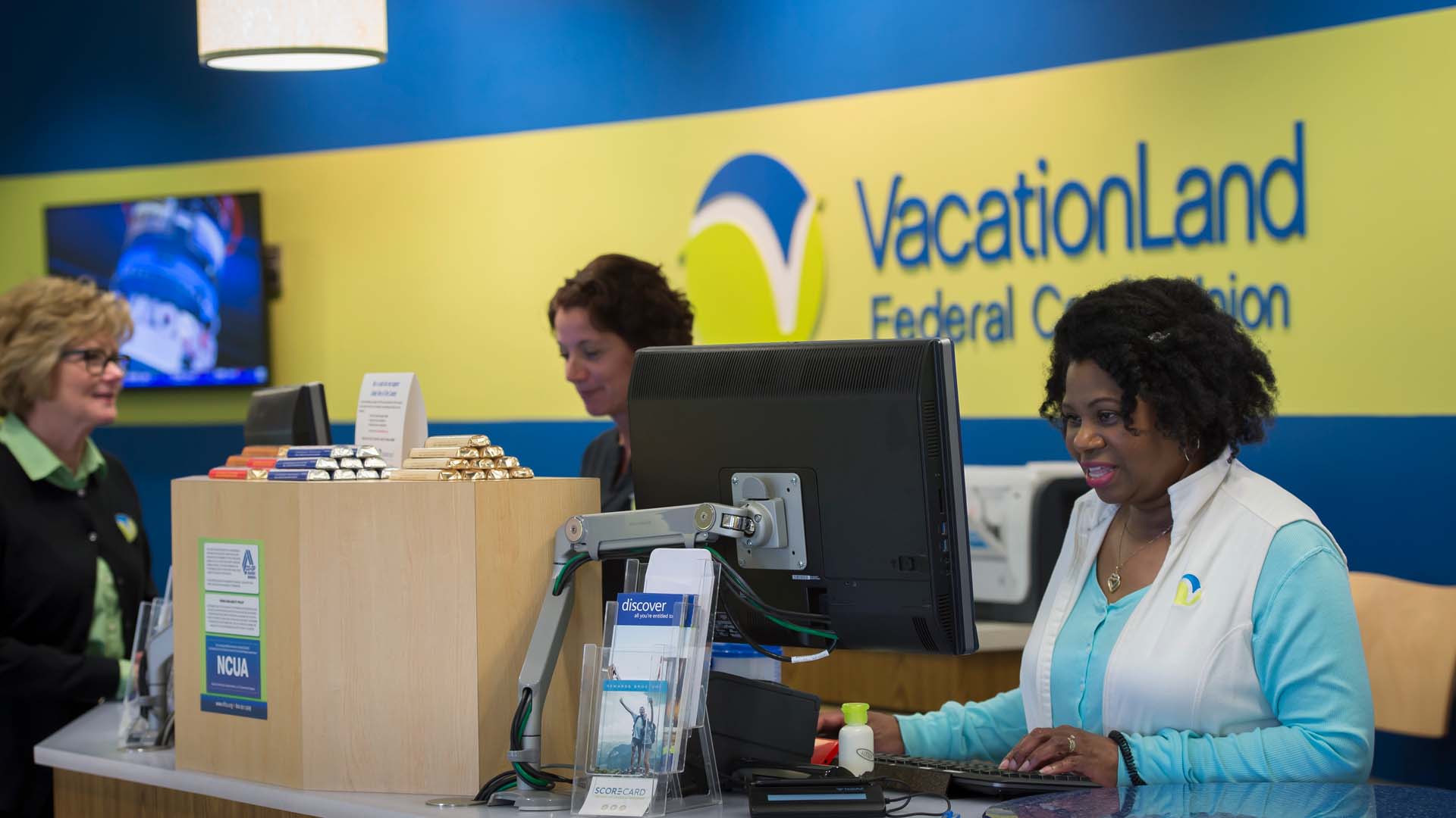 Slider - VacationLand Federal Credit Union teller line