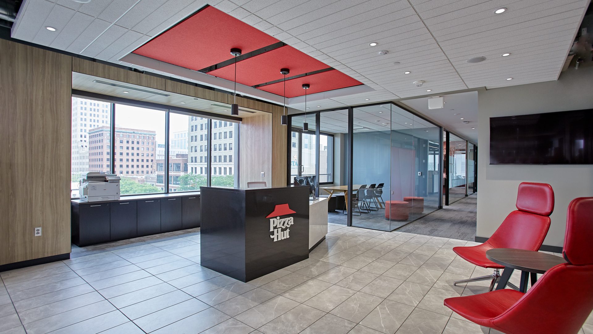 Pizza Hut HQ Reception Desk with Red ceiling detail