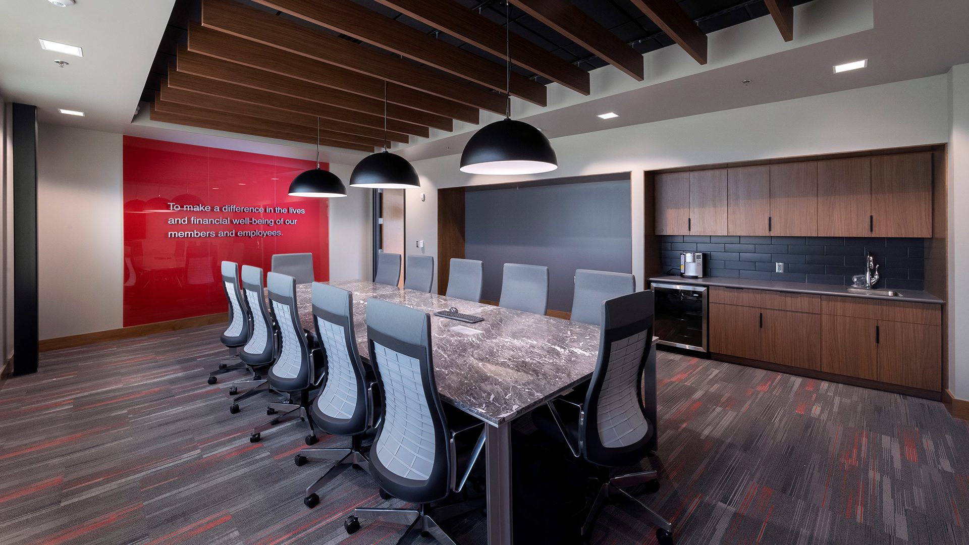 ALEC Conference room with wood ceiling and red accent wall