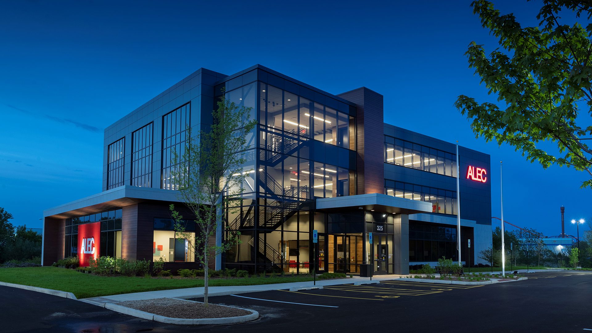 ALEC exterior with glowing light through windows