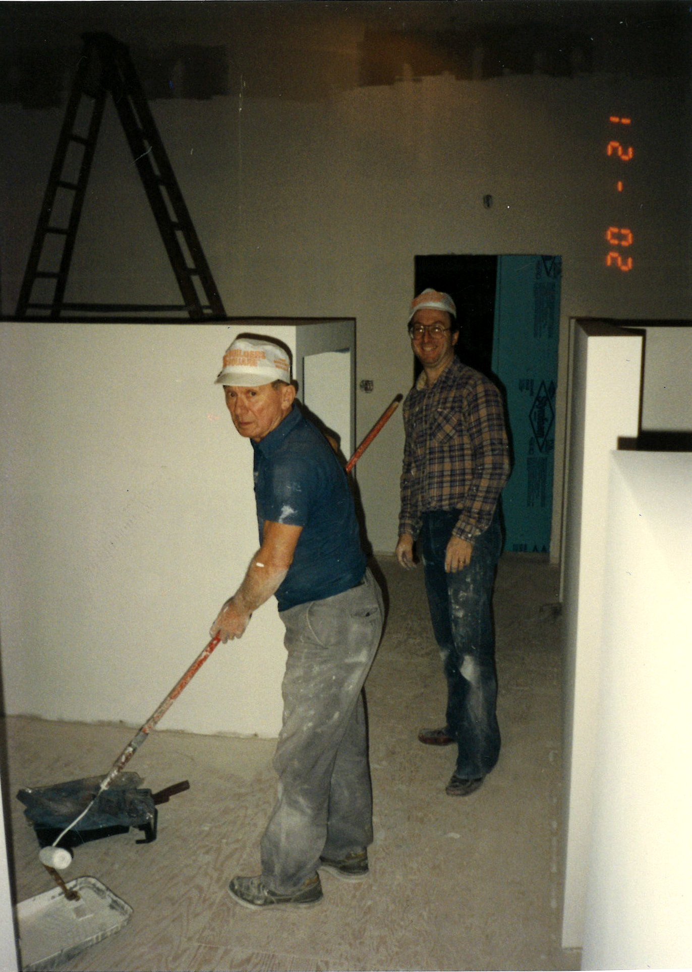 Terry and his Dad painting the original office