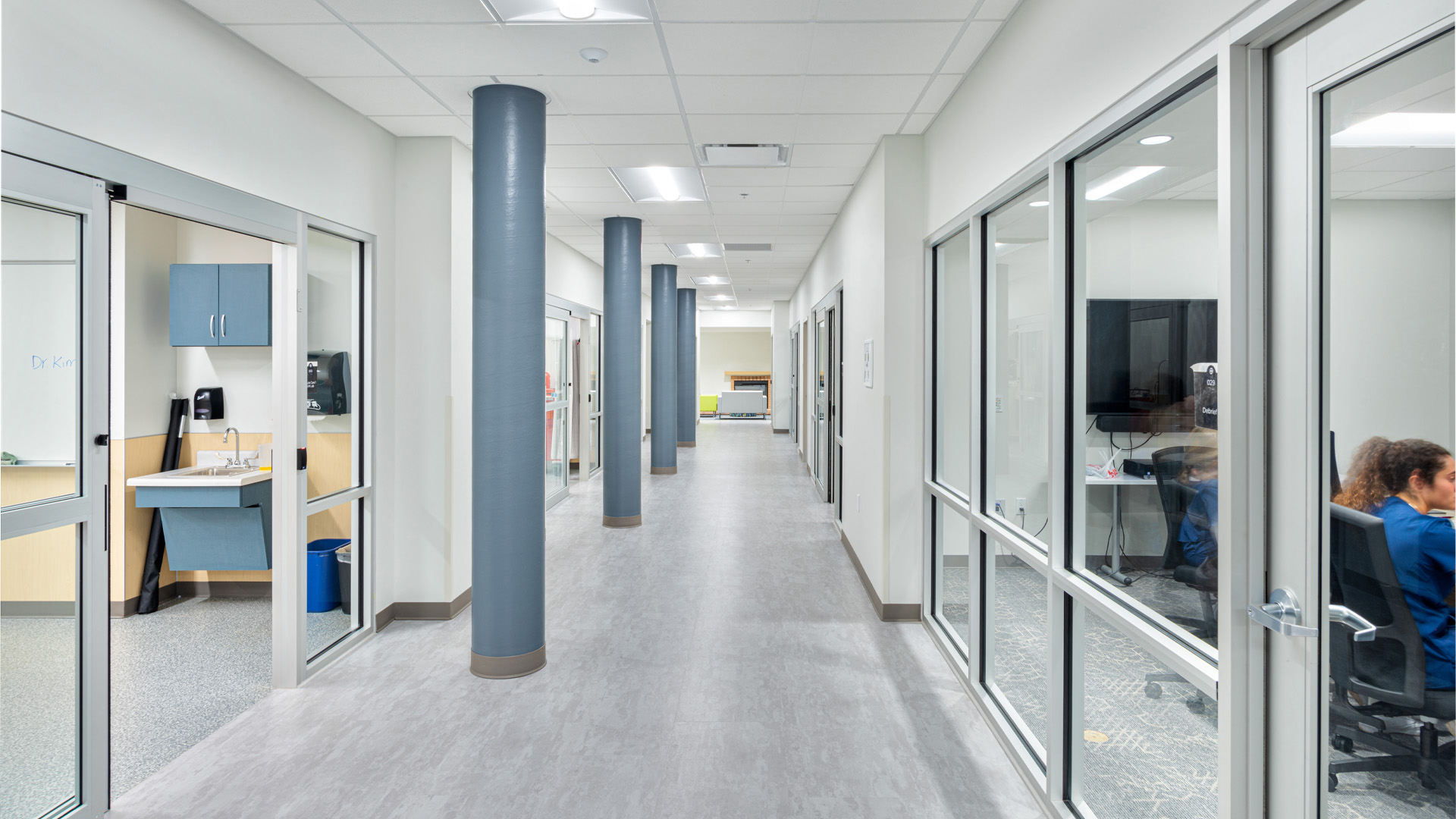 Health sciences hallway with classrooms and sim lab.