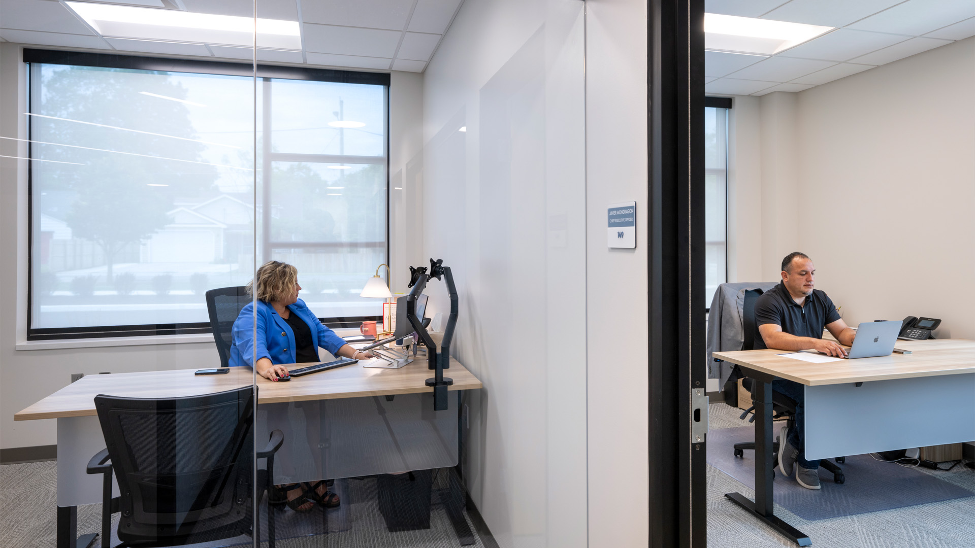 private office with large glass wall.