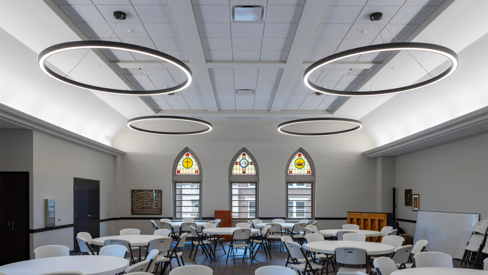 Banquet hall with preserved stained glass windows at the St. Pauls Lutheran Church in Fort Wayne, Indiana.