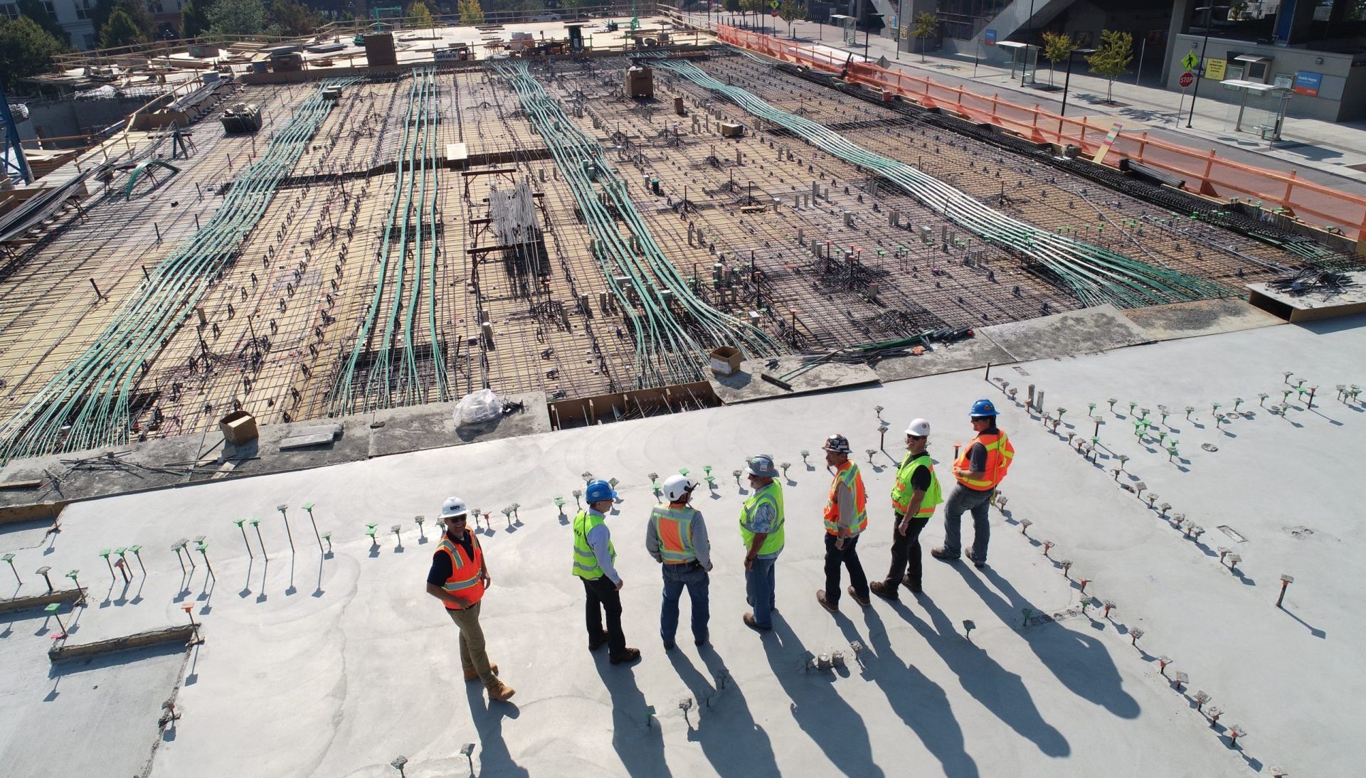 Architects and Engineering on Building Foundation