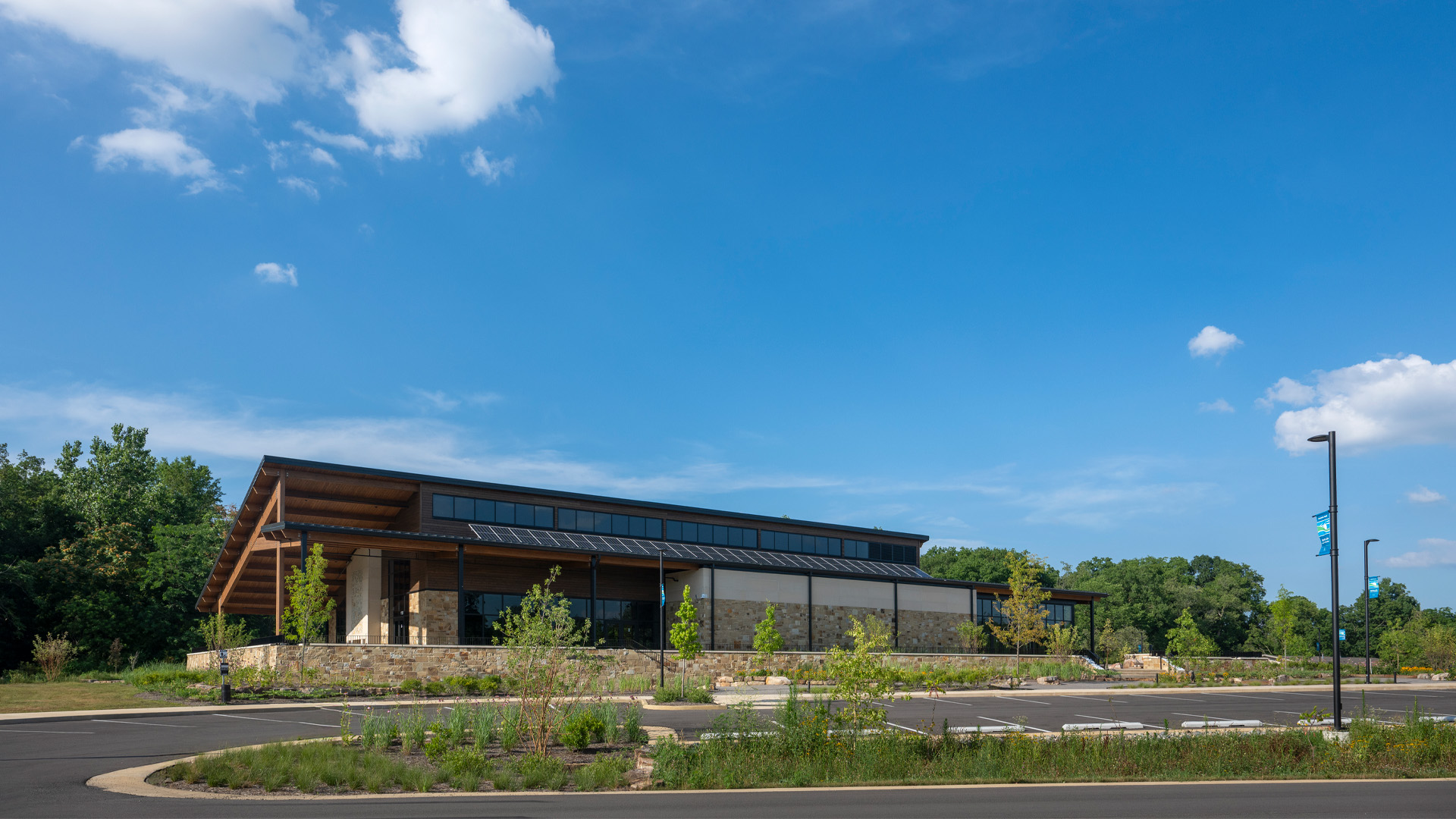 Franke Park Pavilion made of wood, stone and glass.