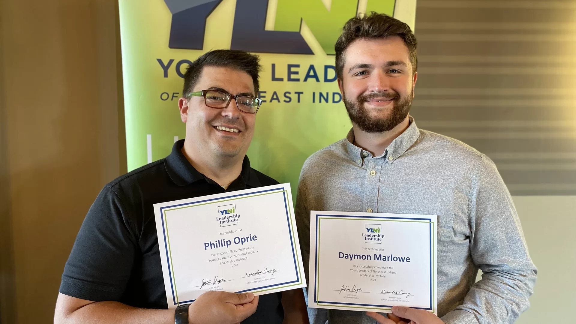 Phillip Oprie and Daymon Marlowe with YLNI Certificates