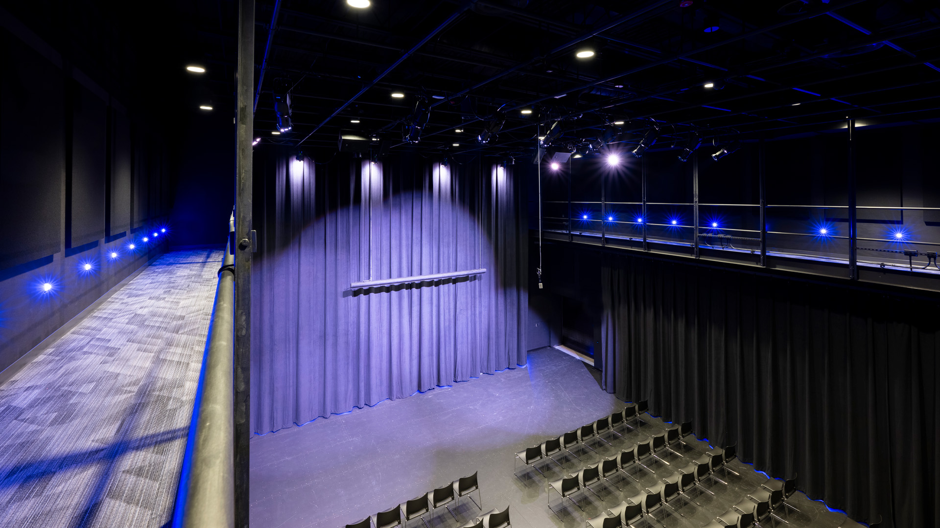 Black box theatre with seating.