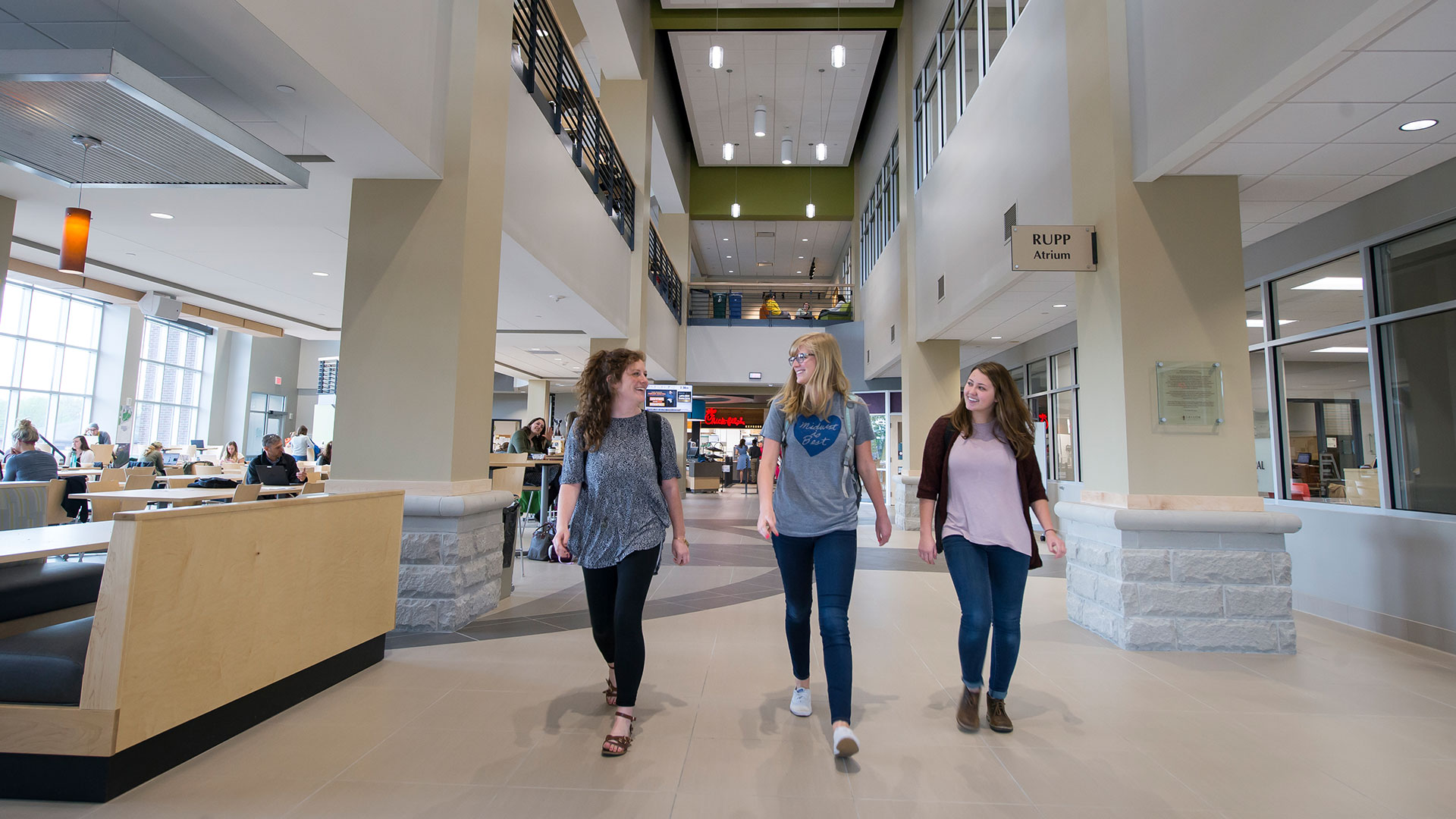 College Students Walking through Student Center