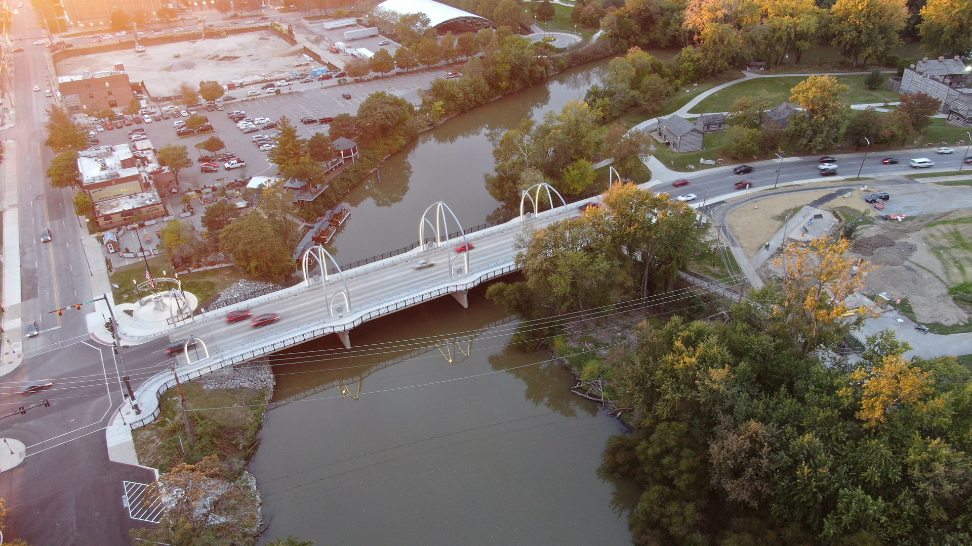 At sunset, cars drive across the Veteran's Memorial Bridge in Fort Wayne, Indiana.