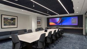 Conference room with bold ceiling and lighting design.