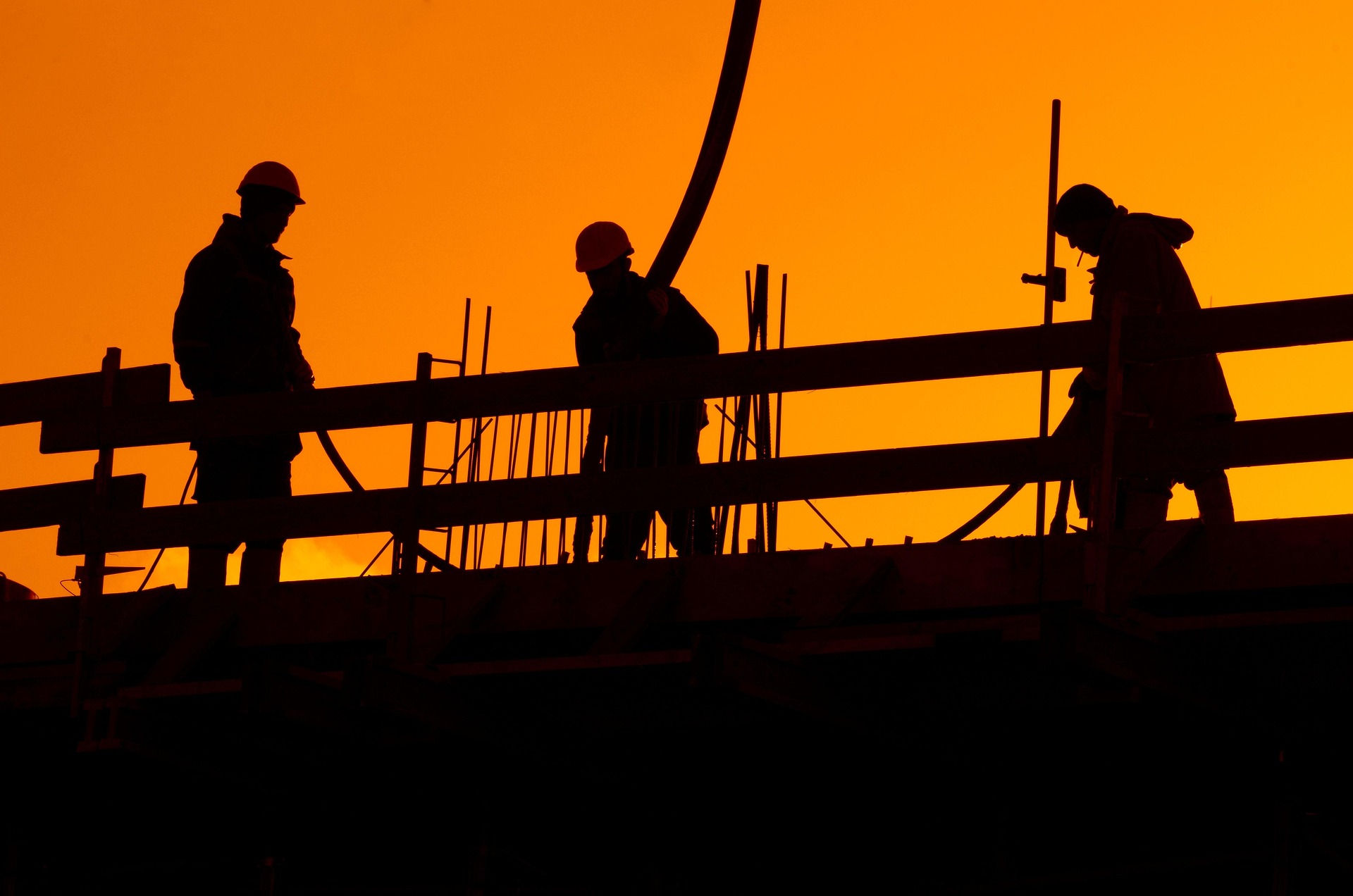 Construction Worker Pouring Cement