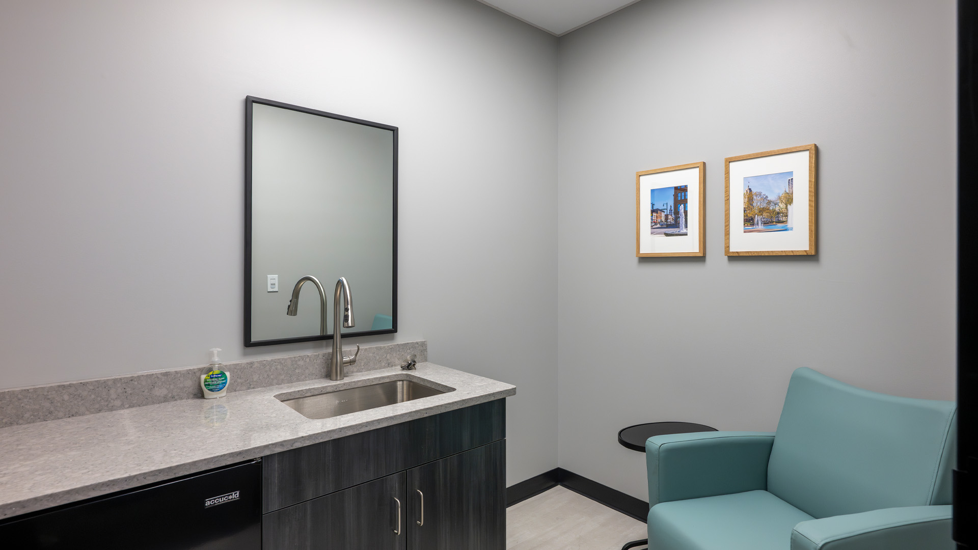 Calming Mothers Room with gray and blue color tones in Greenway Bank.