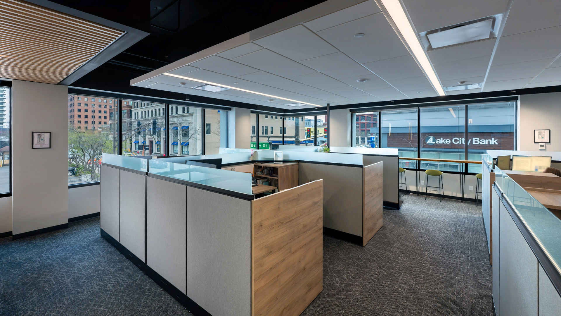 Wood and gray felt paneled Office cubicles in Greenway Bank