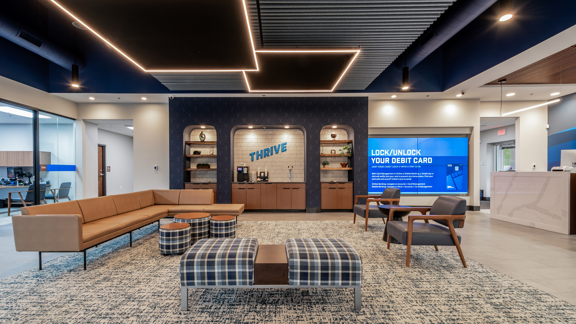 Credit union lobby with private rooms and lobby seating.