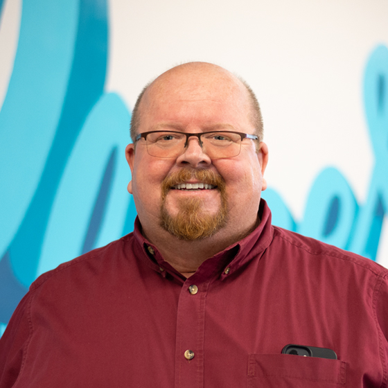 Design Collaborative employee Brian Andrews headshot.