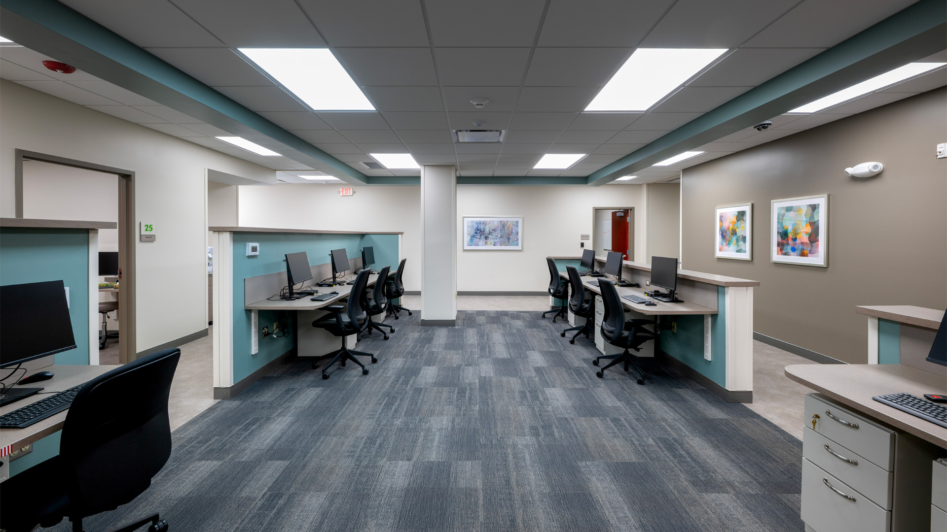 Nurses station with teal walls in a central location in the Parkview Physicians Group Scott Road Clinic.