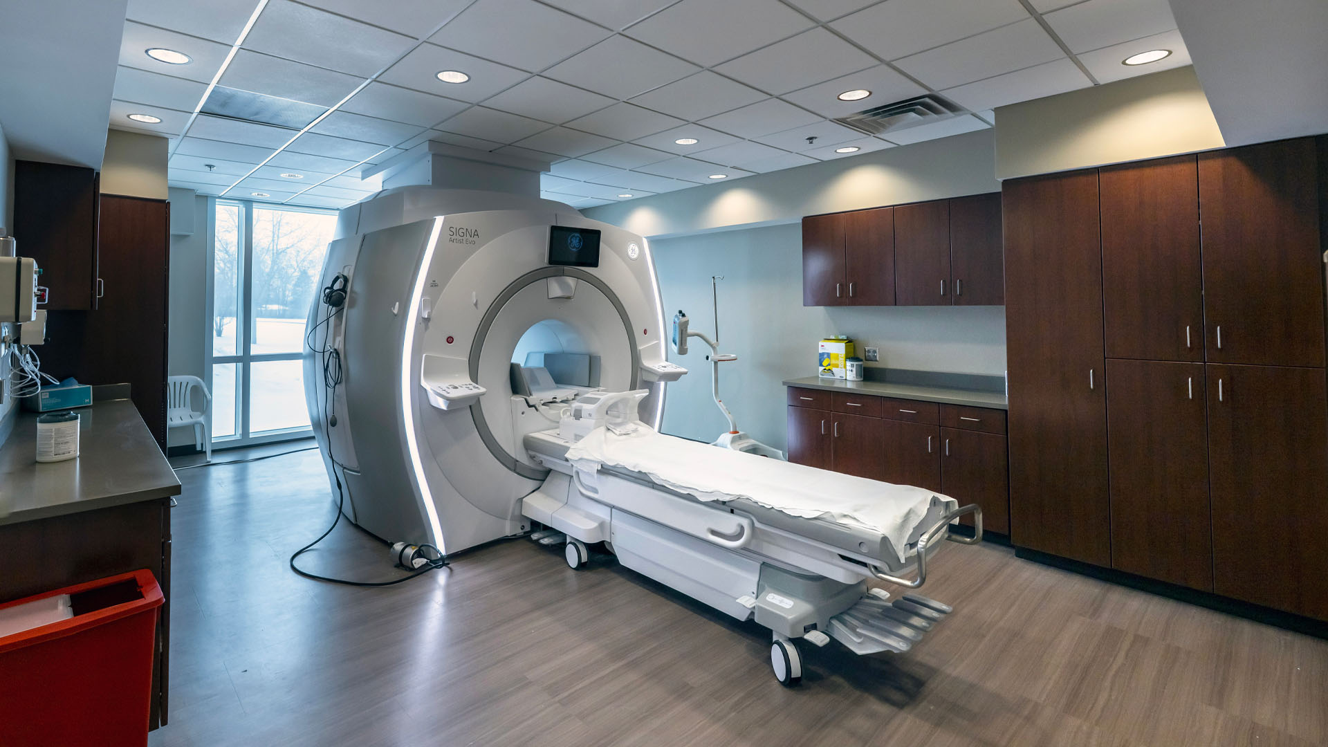MRI room at Parkview Huntington Hospital with wood cabinets and natural light.