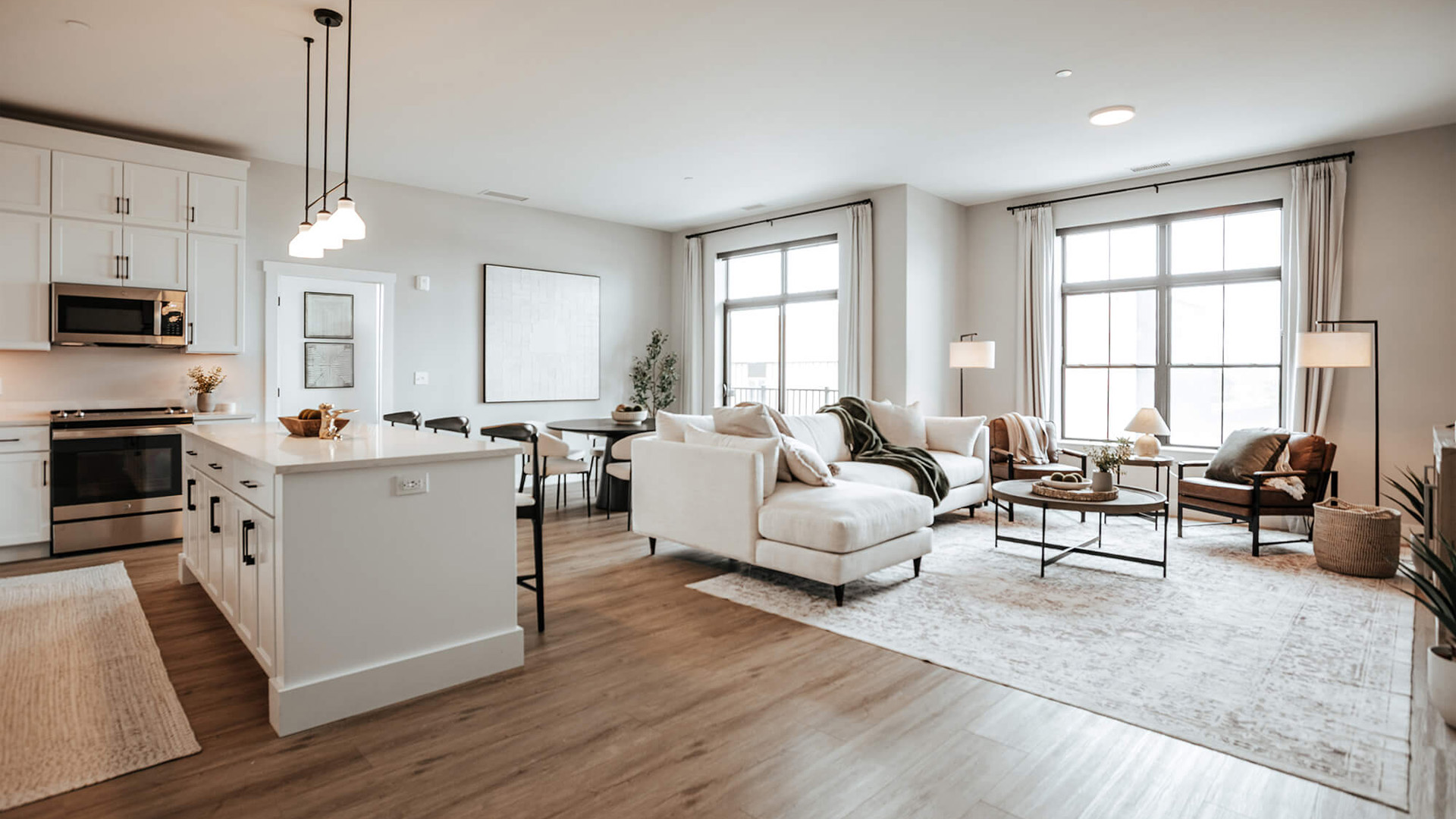 A modern apartment unit with kitchen and living space in the Pearl in downtown Fort Wayne.