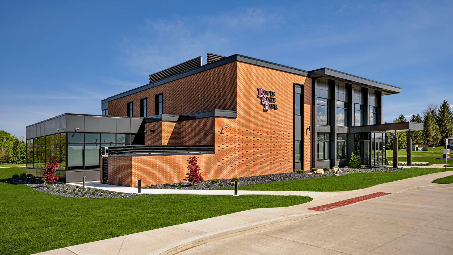 Exterior view of the Bippus State Bank Operations Center in Huntington Indiana with a brick exterior and modern features.
