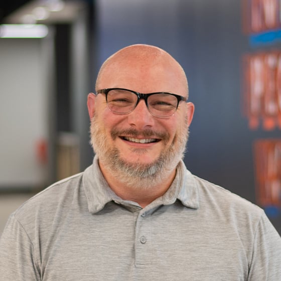 Design Collaborative Architectural Designer Christopher Cooper's headshot.